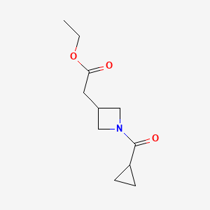 molecular formula C11H17NO3 B8430204 Ethyl[1-(cyclopropylcarbonyl)-3-azetidinyl]acetate 