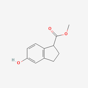 molecular formula C11H12O3 B8433400 Methyl 2,3-dihydro-5-hydroxy-1H-inden-1-carboxylate 