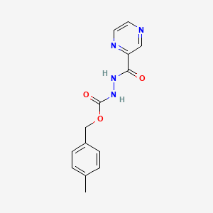 molecular formula C14H14N4O3 B8441444 p-tolylmethyl N-(pyrazine-2-carbonylamino)carbamate 