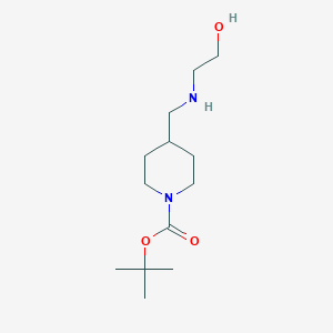molecular formula C13H26N2O3 B8443439 tert-Butyl 4-{[(2-hydroxyethyl)amino]methyl}piperidine-1-carboxylate 