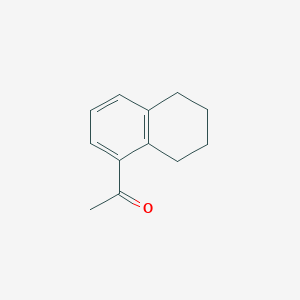 B084459 1-(5,6,7,8-Tetrahydronaphthalen-1-yl)ethanone CAS No. 13577-40-7