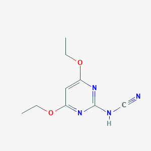 molecular formula C9H12N4O2 B008446 Cyanamide, (4,6-diethoxy-2-pyrimidinyl)-(9CI) CAS No. 103355-79-9