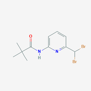 molecular formula C11H14Br2N2O B8448584 N-[6-(Dibromomethyl)-2-pyridyl]-2,2-dimethylpropionamide 