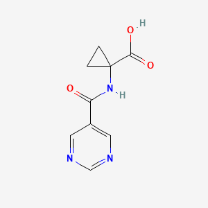 1-[(Pyrimidine-5-carbonyl)-amino]cyclopropanecarboxylic acid
