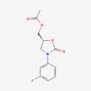 [(5R)-3-(3-fluorophenyl)-2-oxo-1,3-oxazolidin-5-yl]methyl acetate