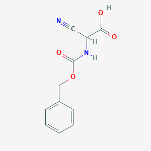 molecular formula C11H10N2O4 B8469308 2-Benzyloxycarbonylamino-2-cyanoacetic acid 