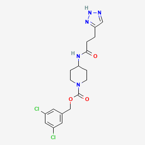 3,5-Dichlorobenzyl 4-(3-(1H-1,2,3-triazol-4-yl)propanamido)piperidine-1-carboxylate