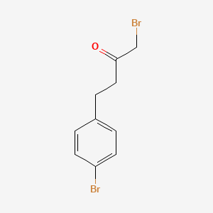 1-Bromo-4-(4-bromophenyl)-2-butanone