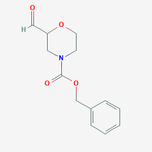 molecular formula C13H15NO4 B8495061 Benzyl 2-formylmorpholine-4-carboxylate 