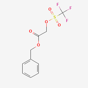molecular formula C10H9F3O5S B8503227 Benzyl 2-(((trifluoromethyl)sulfonyl)oxy)acetate 