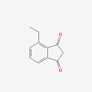 molecular formula C11H10O2 B8532700 4-Ethyl indane-1,3-dione 