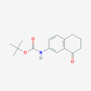 molecular formula C15H19NO3 B8532961 7-tert-Butoxycarbonylaminotetralone 