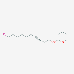 2-[(10-Fluorodec-3-YN-1-YL)oxy]oxane