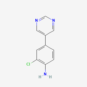 2-Chloro-4-(pyrimidin-5-yl)aniline