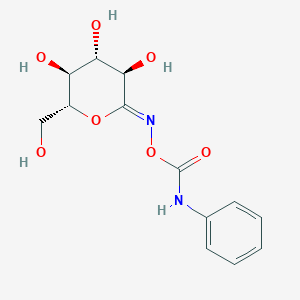 molecular formula C13H16N2O7 B008543 Gluconophylurethane CAS No. 102579-56-6