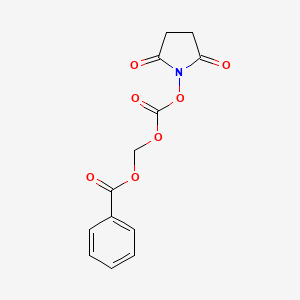 ({[(2,5-Dioxopyrrolidin-1-yl)oxy]carbonyl}oxy)methyl benzoate