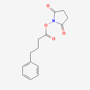 1-[(4-Phenylbutanoyl)oxy]pyrrolidine-2,5-dione