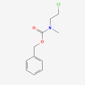 molecular formula C11H14ClNO2 B8572282 Benzyl (2-chloroethyl)methylcarbamate 