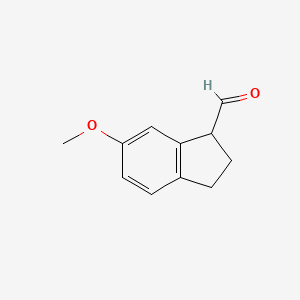 molecular formula C11H12O2 B8573549 6-Methoxyindane-1-carbaldehyde 