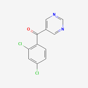 molecular formula C11H6Cl2N2O B8581242 Methanone,(2,4-dichlorophenyl)-5-pyrimidinyl- 