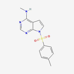 molecular formula C14H14N4O2S B8585357 N-methyl-7-(4-methylbenzenesulfonyl)-7H-pyrrolo[2,3-d]pyrimidin-4-amine CAS No. 910789-32-1