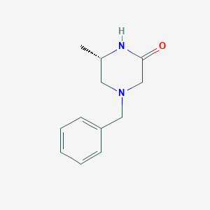 (6S)-4-benzyl-6-methylpiperazin-2-one