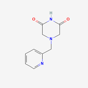 molecular formula C10H11N3O2 B8595061 4-(2-Pyridylmethyl)-2,6-piperazinedione 