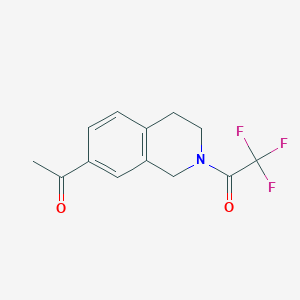 molecular formula C13H12F3NO2 B8595910 1-[2-(Trifluoroacetyl)-1,2,3,4-tetrahydroisoquinoline-7-yl]ethanone 