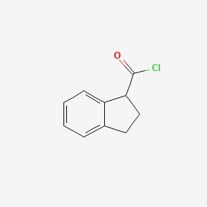 molecular formula C10H9ClO B8614678 Indane-1-carboxylic acid chloride 