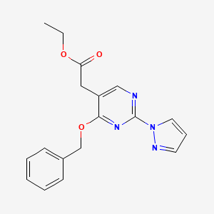 molecular formula C18H18N4O3 B8618658 ethyl 2-(4-phenylmethoxy-2-pyrazol-1-ylpyrimidin-5-yl)acetate 