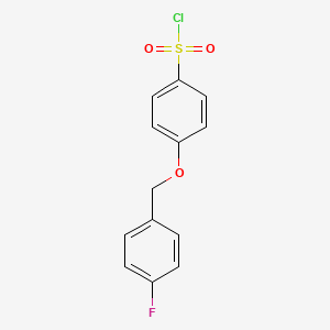 4-[(4-Fluorophenyl)methoxy]benzene-1-sulfonyl chloride