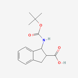 1-[(tert-Butoxycarbonyl)amino]-2,3-dihydro-1H-indene-2-carboxylic acid