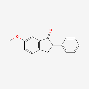 molecular formula C16H14O2 B8629748 6-Methoxy-2-phenylindan-1-one 