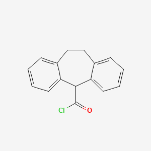 molecular formula C16H13ClO B8649592 10,11-dihydro-5H-dibenzo[a,d]cyclohepten-5-ylcarbonyl chloride 