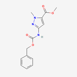 molecular formula C14H15N3O4 B8649674 Methyl 3-{[(benzyloxy)carbonyl]amino}-1-methyl-1H-pyrazole-5-carboxylate CAS No. 117860-58-9