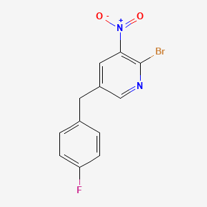 2-Bromo-5-[(4-fluorophenyl)methyl]-3-nitropyridine