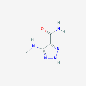 molecular formula C4H7N5O B8680243 4-(Methylamino)-1H-1,2,3-triazole-5-carboxamide 