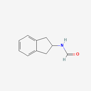 molecular formula C10H11NO B8689198 2-Formylaminoindane CAS No. 24445-43-0