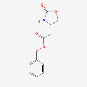 molecular formula C12H13NO4 B8691286 Benzyl 2-(2-oxooxazolidin-4-yl)acetate 