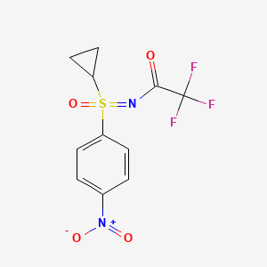 molecular formula C11H9F3N2O4S B8694159 N-[(R)-Cyclopropyl(4-nitrophenyl)oxidosulphanylidene]-2,2,2-trifluoroacetamide 