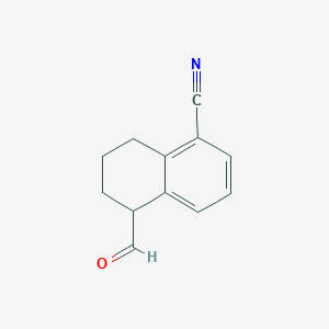 molecular formula C12H11NO B8699844 5-Formyl-5,6,7,8-tetrahydronaphthalene-1-carbonitrile 