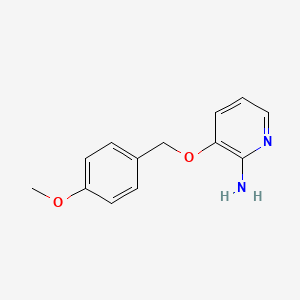 molecular formula C13H14N2O2 B8709422 3-[(4-Methoxybenzyl)oxy]pyridin-2-amine 