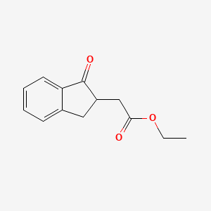 molecular formula C13H14O3 B8719443 Ethyl 2-(1-oxo-2,3-dihydro-1H-inden-2-yl)acetate CAS No. 57932-07-7