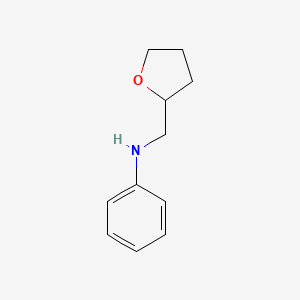 molecular formula C11H15NO B8720068 N-[(oxolan-2-yl)methyl]aniline 