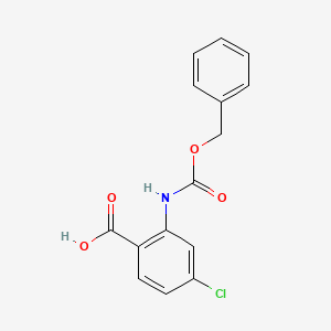 molecular formula C15H12ClNO4 B8726398 2-{[(Benzyloxy)carbonyl]amino}-4-chlorobenzoic acid CAS No. 112733-44-5