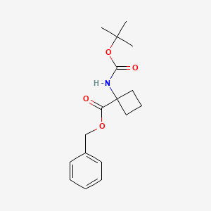 molecular formula C17H23NO4 B8726446 Benzyl-1-(tert-butoxycarbonyl)cyclobutanecarboxylate 