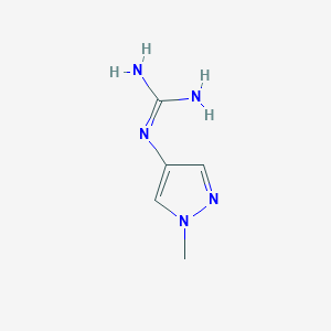 molecular formula C5H9N5 B8745662 2-(1-methylpyrazol-4-yl)guanidine 