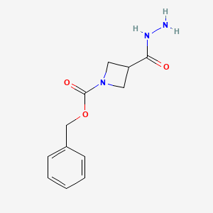 molecular formula C12H15N3O3 B8747403 Benzyl 3-(hydrazinocarbonyl)azetidine-1-carboxylate 
