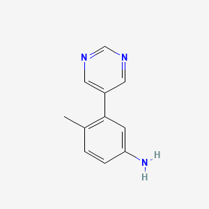 molecular formula C11H11N3 B8750409 4-Methyl-3-(pyrimidin-5-yl)aniline 