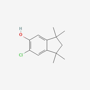molecular formula C13H17ClO B8757924 6-Chloro-1,1,3,3-tetramethylindan-5-ol CAS No. 53718-35-7